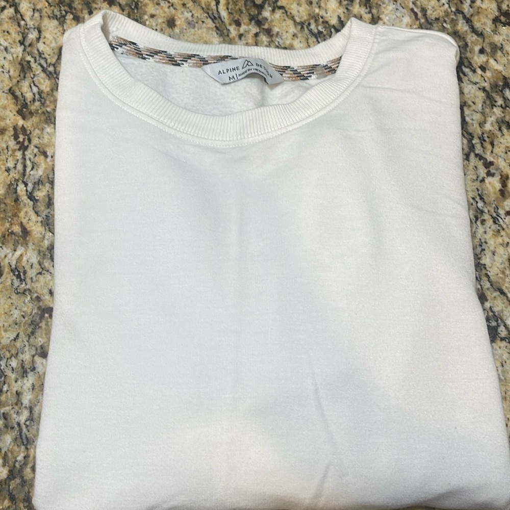 Cream in color size medium alpine sweater